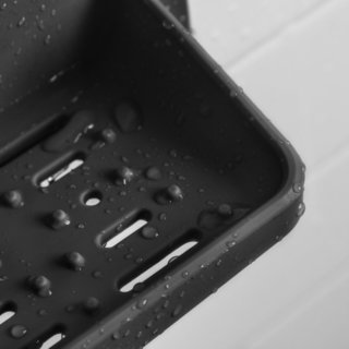 close up of tooletries soap holder drainage holes