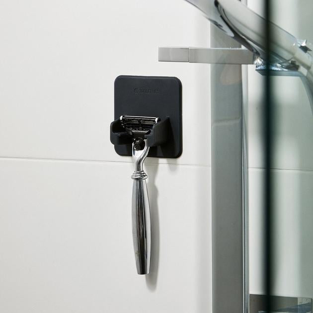 tooletries mason razor holder shown on shower wall